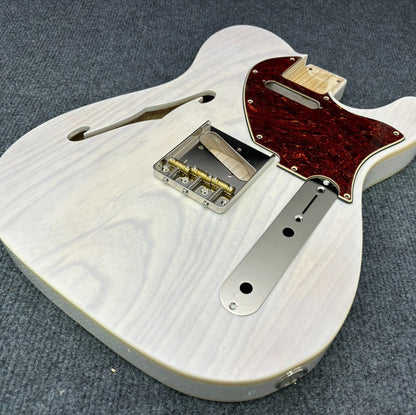 The semi-hollow body of TL electric guitar is 55.9mm wide and 17mm deep, with standard brass bridge and customized circuit.