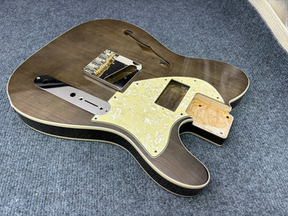 The semi-hollow body of TL electric guitar is 55.9mm wide and 17mm deep, with standard brass bridge and customized circuit.