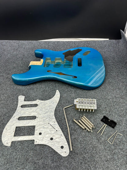 The semi-hollow body of the adapted ST electric guitar is 55.9mm wide and 17mm deep, with standard brass vibrato bridge and customized circuit.
